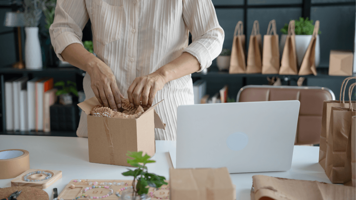 Small business owner planning a low cost business launch in the UK